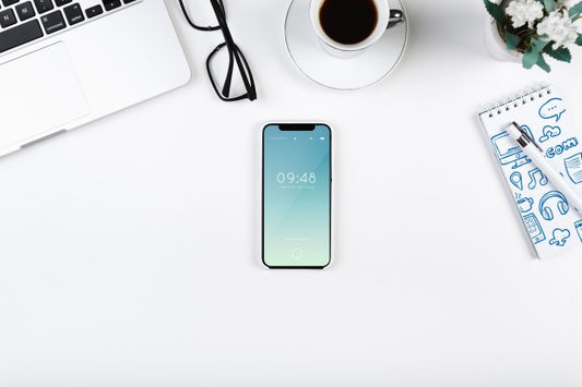 Free Top View Smartphone Mockup On Workspace Psd