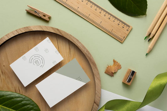 Free Top View Stationery With Wood And Plant Psd
