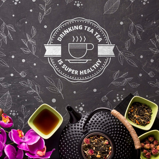 Free Top View Tea Pot With Herbs And Flowers Psd