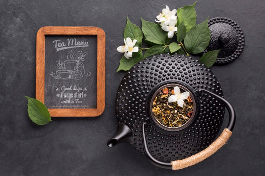 Free Top View Tea Pot With Spices And Tea Menu Psd