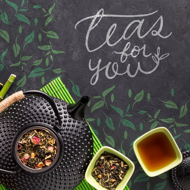 Free Top View Tea Pot With Tasty Herbs Concept Psd