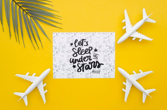 Free Top View Travelling Plane And Card With Lettering Psd