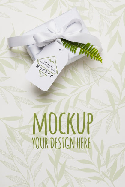Free Top View White Gift With Mock-Up Tag Psd