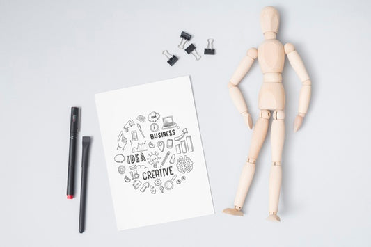 Free Top View Wooden Doll With Mock-Up Psd