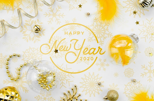 Free Top View Yellow New Year Party Accessories And Happy New Year Lettering Psd