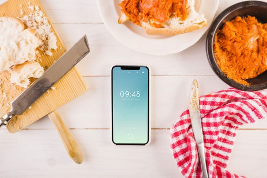 Free Traditional Spanish Food Mockup With Smartphone Psd