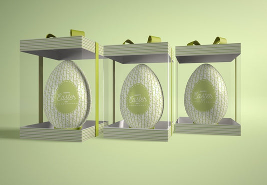 Free Transparent Boxes With Easter Eggs On Table Psd