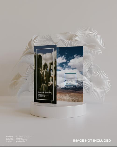 Free Trifold Brochure Mockup With Podium And White Plant In Behind Looks Front View Psd