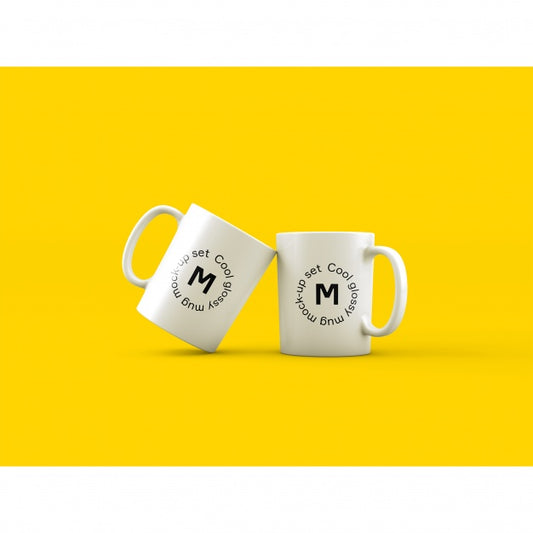 Free Two Mugs On Yellow Background Mock Up Psd