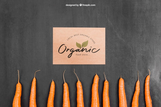 Free Vegetables Mockup With Cardboard And Carrots Psd
