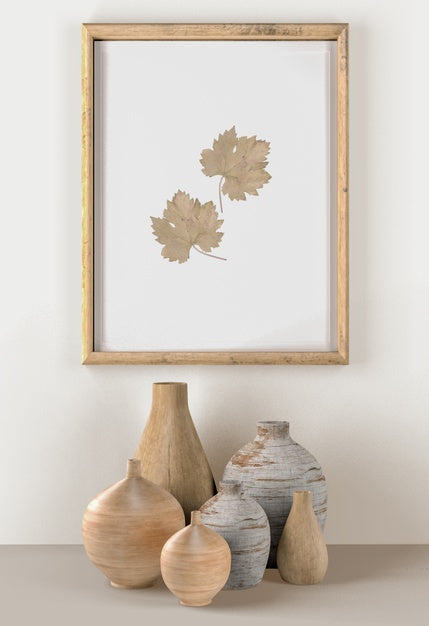 Free Wall With Vases And Frame With Leaves Psd