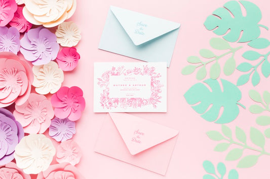 Free Wedding Invitation Mock-Up And Envelopes With Paper Flowers On Pink Background Psd