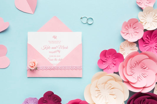 Free Wedding Rings And Invitation Mock-Up With Paper Flowers Psd