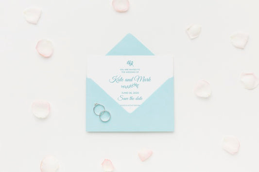 Free Wedding Rings And Invitation Mock-Up With Petals Psd