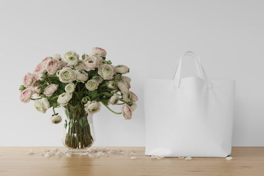 Free White Bag And Flowers In A Vase Psd