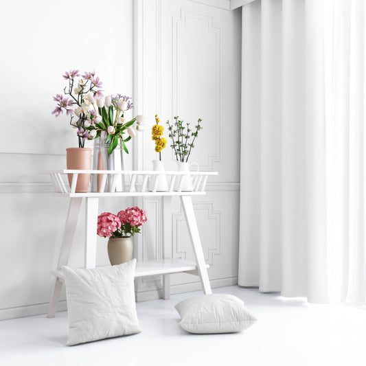Free White Decorative Furniture With Beautiful Plants And Pillowcases Mockup Psd