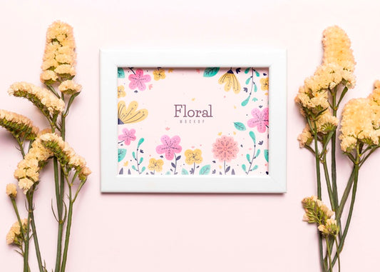 Free White Frame With Flowers Arrangement Psd