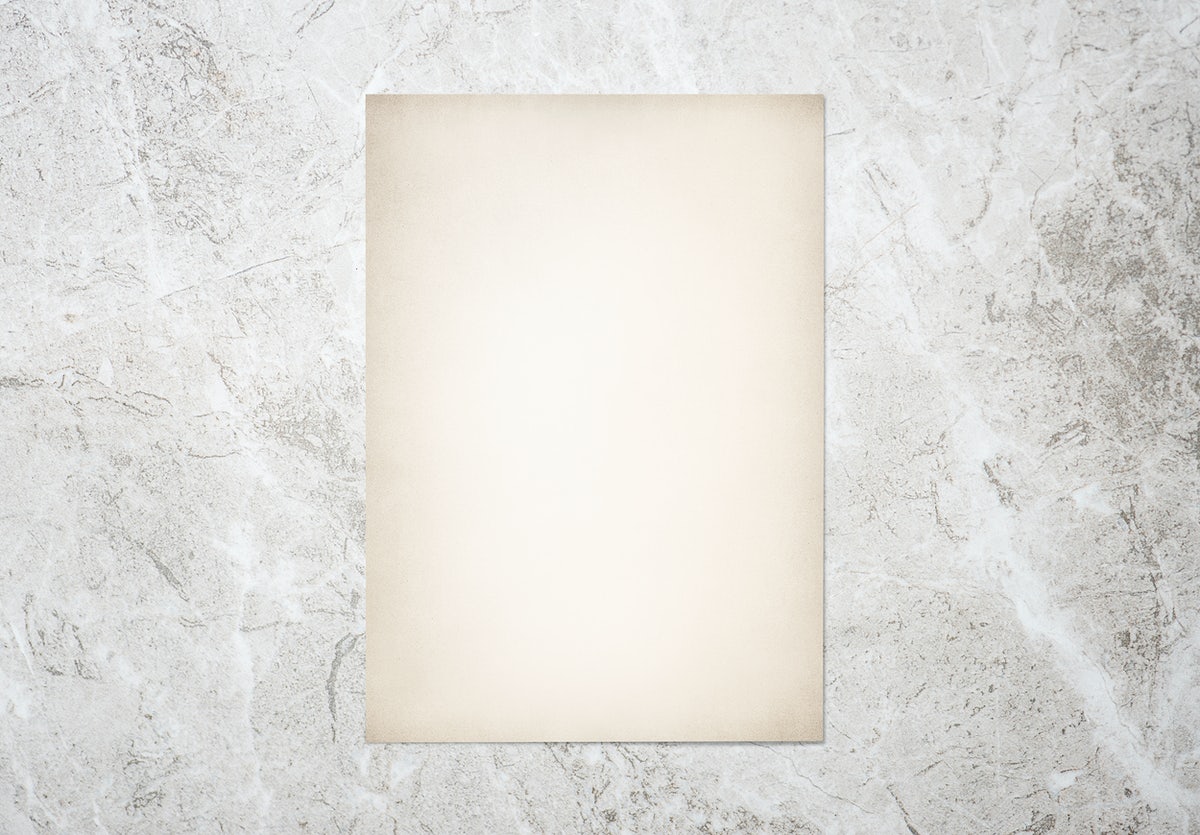 Free White Paper On A Gray Marble Background