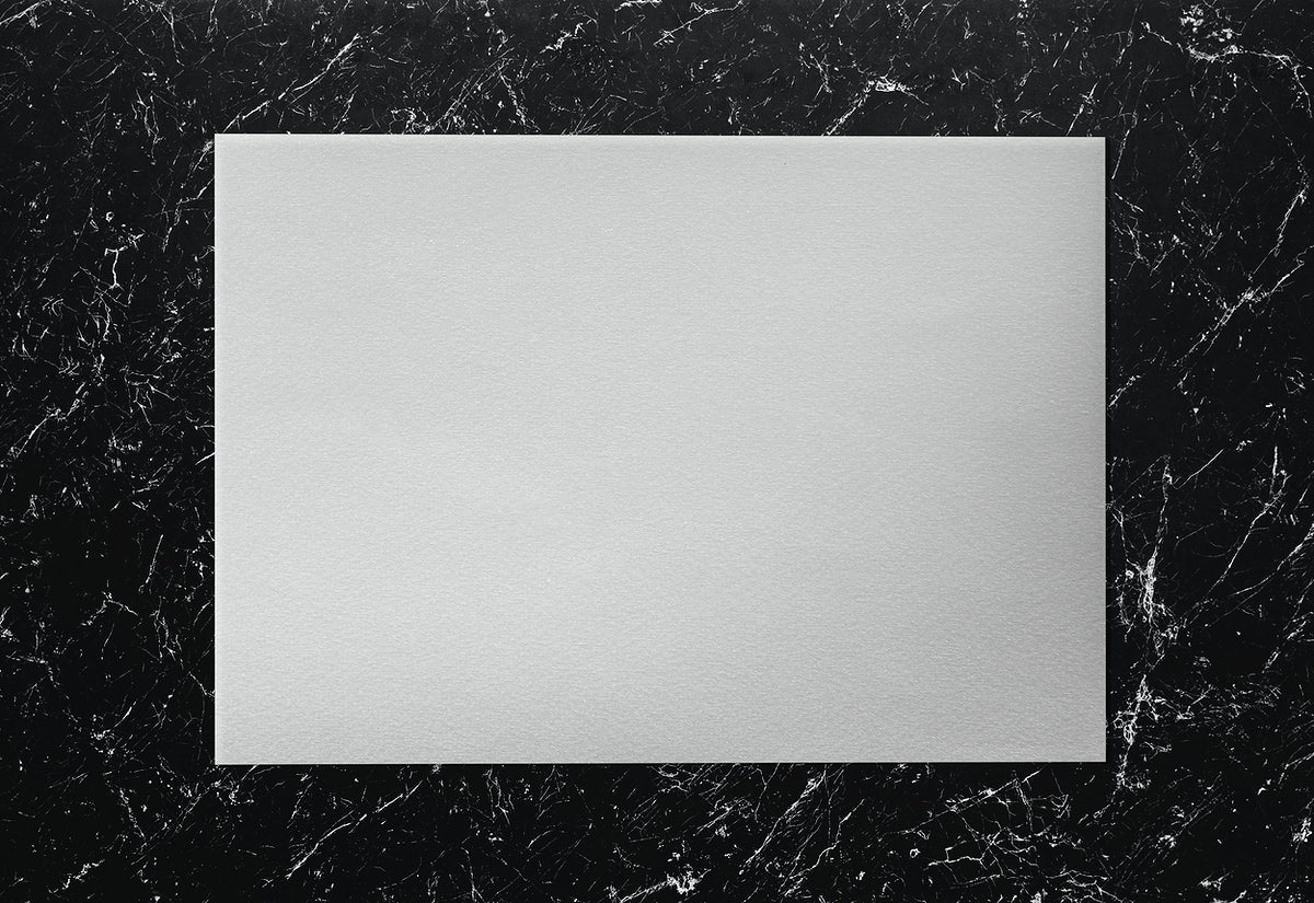 Free White Paper On A Marble Background