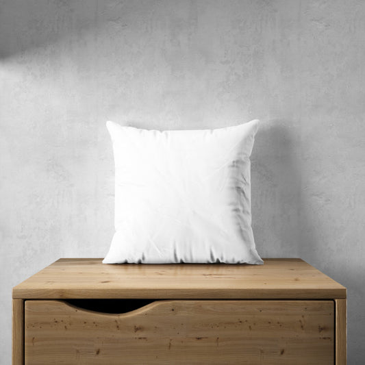 Free White Pillowcase Mockup On A Wooden Furniture Psd