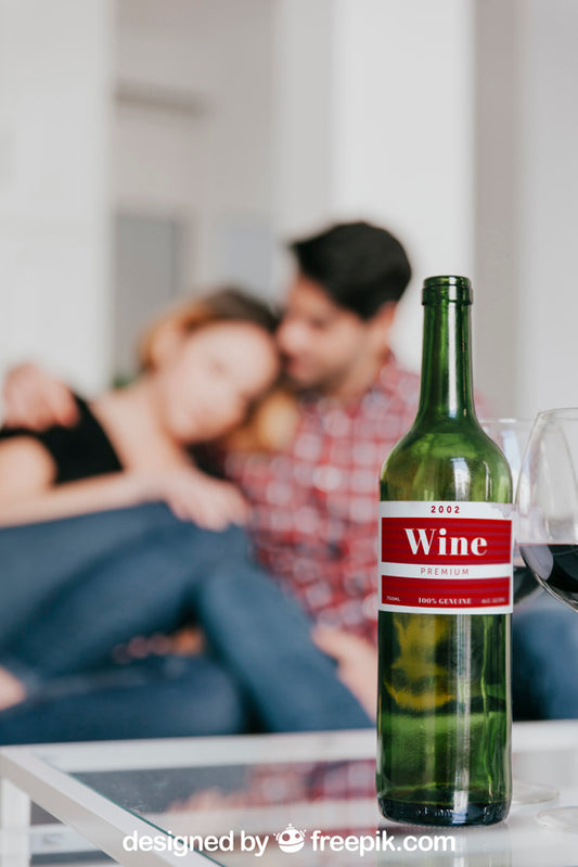 Free Wine Mockup With Couple On Couch Psd