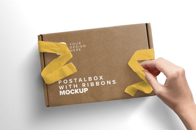 Free Woman Hand Opening Postal Box With Ribbons Mockup Psd