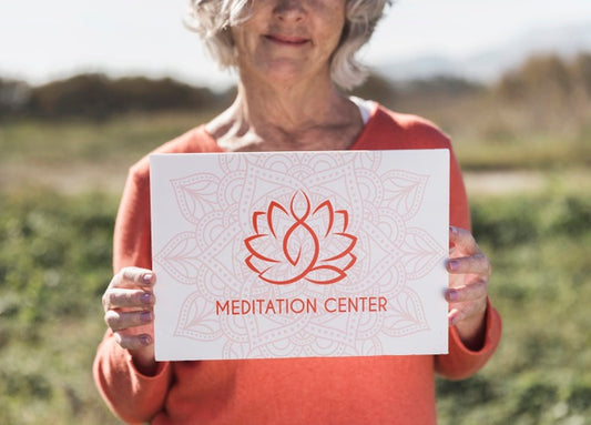 Free Woman Holding A Meditation Center Logo Sign Psd