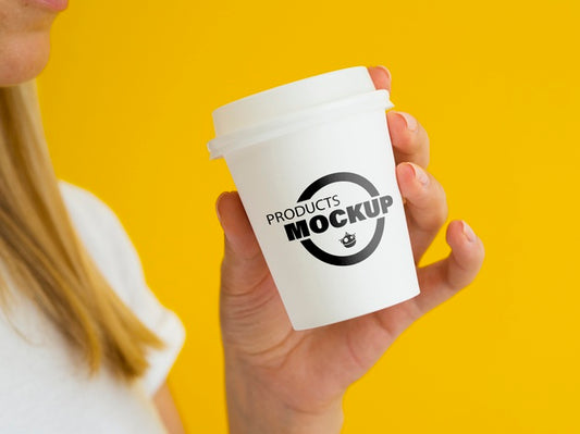 Free Woman Holding A White Coffee Cup Mock-Up Psd