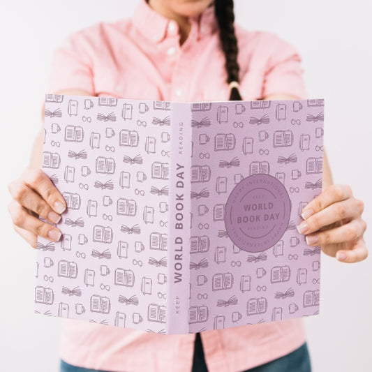 Free Woman Holding Book Cover Mockup Psd