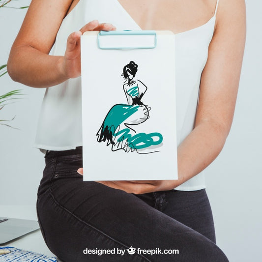 Free Woman Holding Clipboard With Mock Design Psd