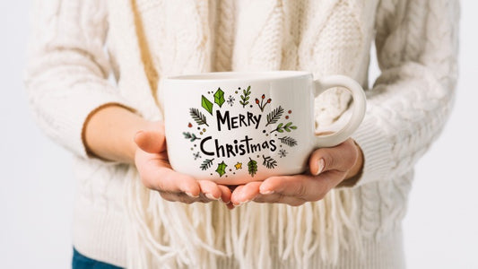 Free Woman Holding Cup Mockup With Christmas Concept Psd