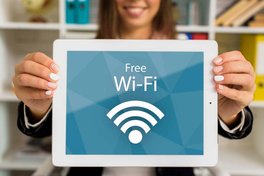 Free Woman Holding Digital Tablet With Wi-Fi Lettering Psd