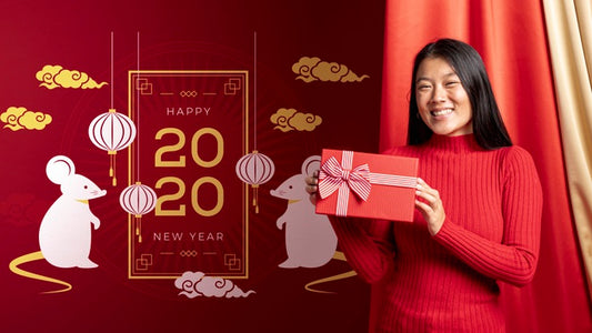 Free Woman Holding Gift Box For New Year Psd