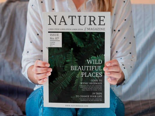 Free Woman Holding Magazine About Nature Psd
