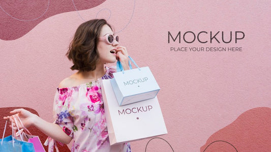 Free Woman Holding Mock-Up Paper Bags Psd