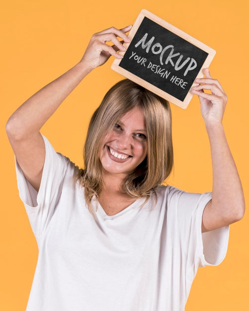 Free Woman Holding Sign Mock-Up Psd