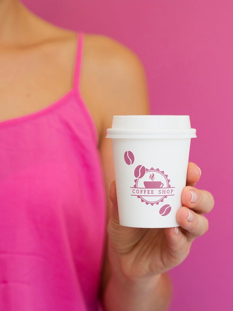 Free Woman Holding Small Paper Coffee Cup Mock-Up Psd