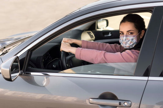 Free Woman In Car Wearing Medical Mask Psd