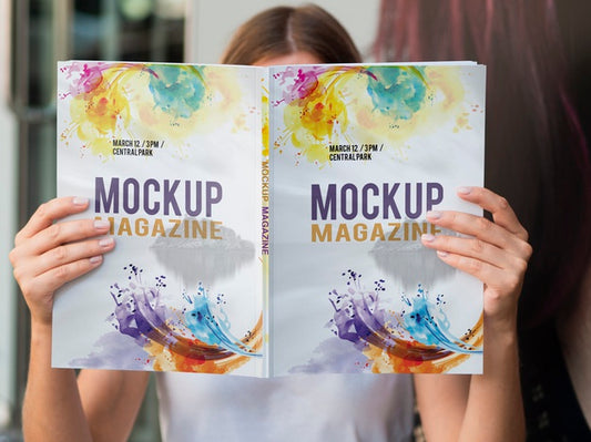 Free Woman Looking Into A Mock Up Magazine Psd