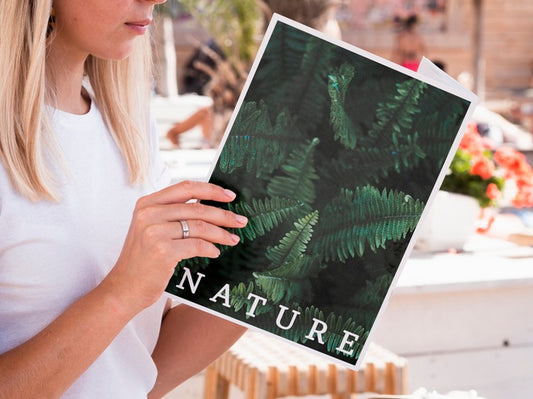 Free Woman Looking Into A Nature Book Mock Up Psd