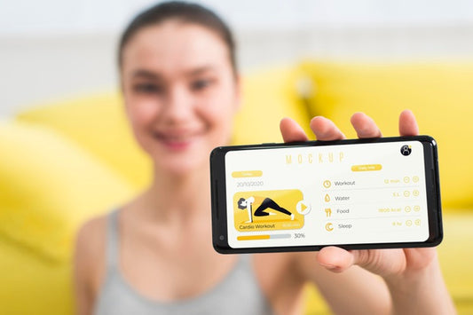Free Woman Showing A Fitness Exercise On Mobile Phone Psd