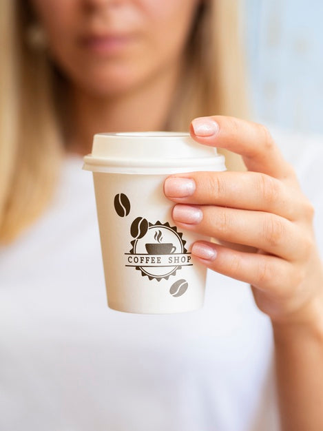 Free Woman Wanting To Drink From A Coffee Paper Cup Psd