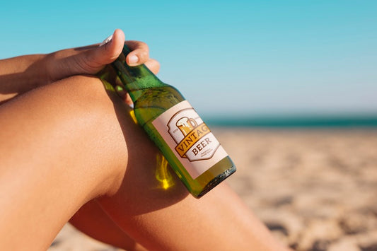 Free Woman With Beer Bottle Mockup At The Beach Psd