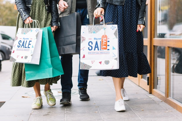 Free Women With Shopping Bags In City Psd