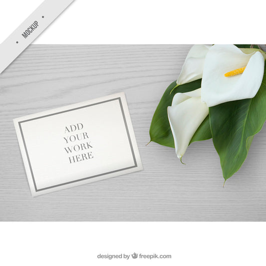 Free Wooden Desktop With Flowers And Paper Mockup For Showing Your Work Psd