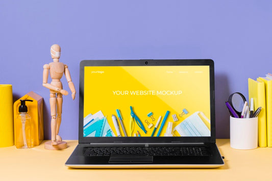 Free Wooden Mannequin And Laptop With Mock-Up Psd