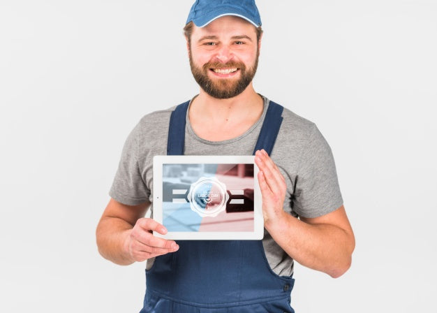 Free Worker Holding Tablet Mockup For Labor Day Psd
