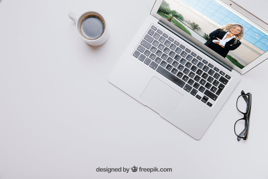 Free Workspace Composition With Laptop And Coffee Psd