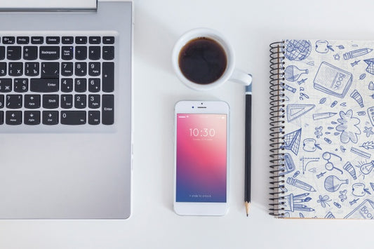Free Workspace Mockup With Smartphone And Laptop Psd