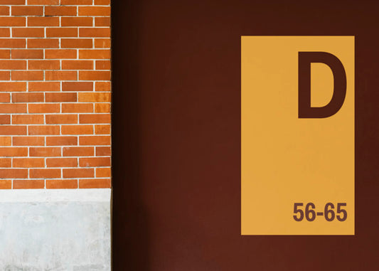 Free Yellow Signboard Mockup On A Brown Wall Psd
